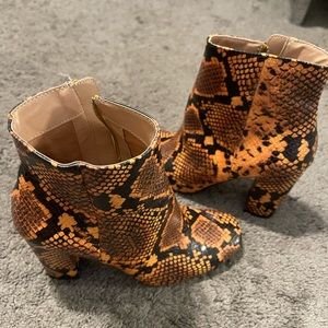 Snake booties Steve Madden